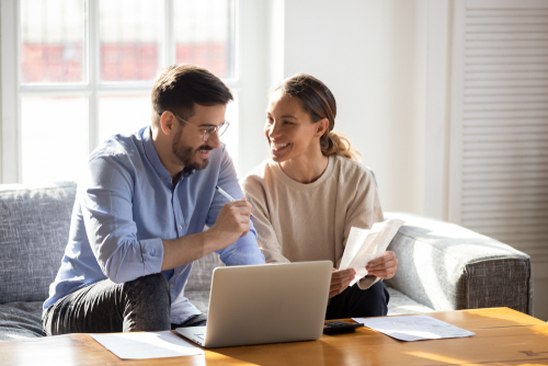 Couple applying for an online loan from EZ Money while at home